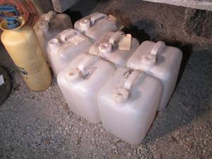lot 599 image: 7 large jugs (6 have caps) and 1 Hu...
