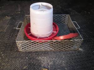 lot 656 image: Chicken feeder and large metal bask...