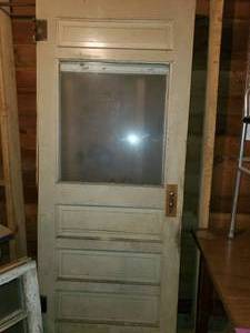 lot 427 image: 2 wood doors 1 has some damage (see...