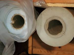 lot 450 image: Large roll of plastic and large rol...