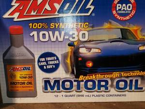 lot 452 image: Case of AmsOil Synthetic 10w-30 oil...
