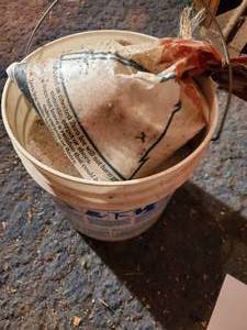 lot 464 image: Bucket of sidewalk salt...