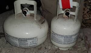 lot 514 image: 2 small propane tanks...