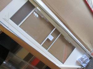 lot 18 image: (FD) Emco Aluminum Storm Door Sized...