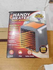 lot 24 image: Handy Heater Pure Warmth Portable Space Heater