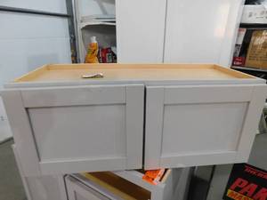 lot 56 image: Hampton Bay Courtland Shaker Assembled 30 in. x 12 in. x 12 in. Stock Wall Kitchen Cabinet in Sterling Gray Finish
