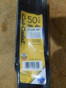 lot 58 image: Cub Cadet Original Equipment High Lift Blade Set for Select 50 in. Riding Lawn Mowers with 6-Point Star OE# 942-05052, 742-05052