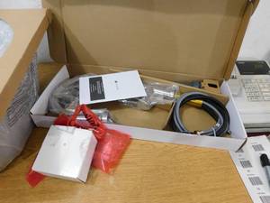 lot 64 image: 24 Stainless sink with faucet and strainer.