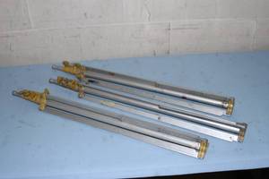 lot 66 image: Lot of 3 - Lowel Adjustable Folding  Portable Tripod Pro Light  Lighting Stands