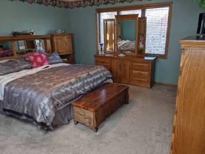 Large Wooden Bedroom Set includes Headboard, Metal Frame, Dresser with Tri-Fold Mirror, Chifferobe, (2) Tall Side Stands