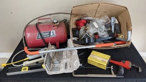 Assortment of Tools ToolShop Portable Air Tank, Pipe Wrench, Level, Rayovac Power Inverter, Stanley Electric Staple Gun, & More