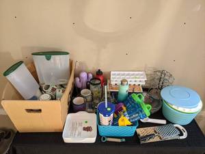 A Variety of Kitchen Supplies Including Mugs, Glasses, Containers, Utensils and More