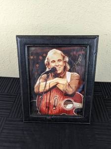 lot 68 image: Jimmy Buffet Autographed Framed Picture 8 x 10