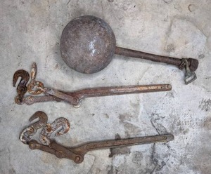 lot 44 image: (2) Vintage Lever Chain Binders and Heavy Metal Ball