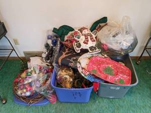 lot 99 image: A Collection of Christmas Decorative Items Including Ornaments, Bows, Light-Up Snowman, Garland and More