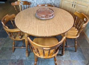 lot 117 image: Vintage Wooden Round Dining Table with (5) Dining Chairs and a Lazy Susan