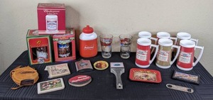 lot 88 image: Budweiser Coasters, Vintage Anheuser Busch Tray, Budweiser Soffware Water Bottle, Budweiser Clydesdales 2003 Holiday Stein, Budweiser 25th Anniversary and Classic Label Stein, Mugs and More