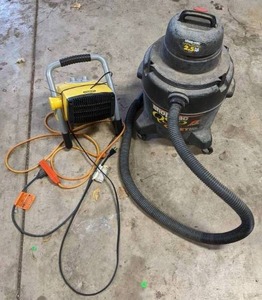 lot 144 image: Stanley Portable Electric Heater and 8 Gal. Shop Vac Quiet Super Power Vacuum