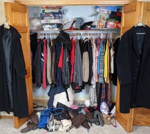 lot 125 image: Variety of Mens & Womens Clothing & Shoes, Plus Board Games Life, Sorry, Clue, Trouble, Monopoly, and More