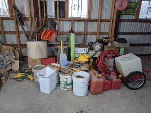 lot 105 image: Gas Cans, Sprayer on Wheels, Large Green Frame, Buckets of Nails, Floodlights and More