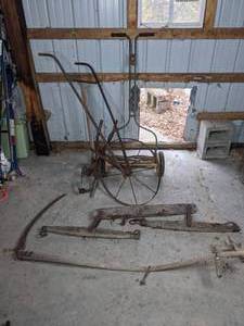 lot 102 image: Antique Manual Push Lawn Mower, Sith, Single Wheel Plow, Wood Yoke and Harness
