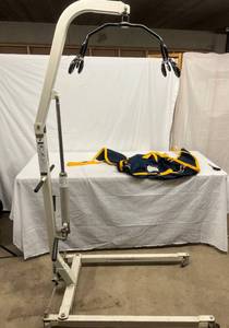 lot 9 image: MSRP $1900 Top Of The Line In High Quality Hoyer Haudraulic Patient Lifts WSling 400lb Capacity 6 Point Cradle Many Uses For This Powerful Lift - Mechanics, Veterinary Clinics, Etc. This Lift Works Great However Has Some Wear &amp Rust In Crevices