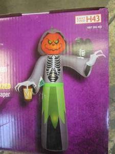 lot 402 image: Home Accents Holiday 10 ft Jack-O-Lantern Head Reaper Halloween Inflatable (OPEN BOX)