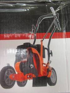 lot 353 image: Powermate 9 in. 79 cc Gas Walk-Behind Edger with Curb Hopping Feature (BOX IS DAMAGED, APPEARS NEW IN BOX)