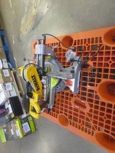 lot 405 image: DEWALT 15 Amp Corded 12 in. Double Bevel Sliding Compound Miter Saw with XPS technology (NO BLADE, TURNS ON)