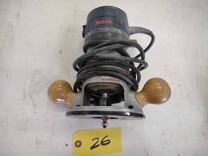 lot 26 image: Bosch 1617EVS Router...