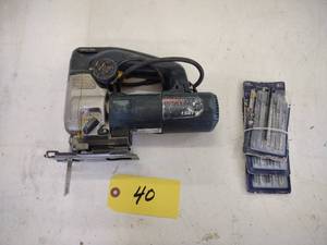 lot 40 image: Bosch Jig Saw with Extra Blades...