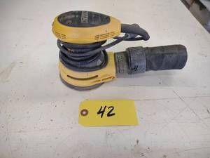 lot 42 image: Dewalt Palm Sander...