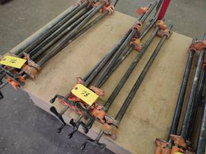 lot 73 image: (6) 32 Pipe Clamps...