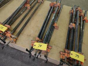 lot 74 image: (6) 28 Pipe Clamps...