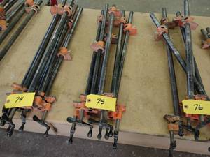 lot 75 image: (6) 28 Pipe Clamps...