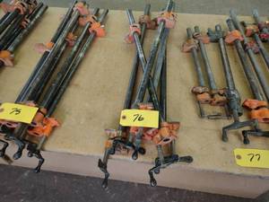lot 76 image: (5) 28 Pipe Clamps...