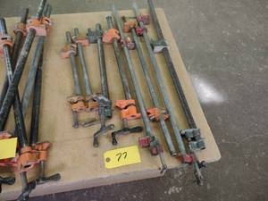 lot 77 image: (8) Assorted Pipe Clamps...