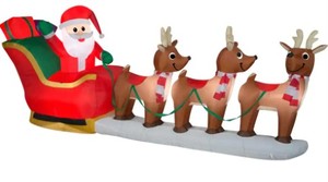 lot 38 image: Home Accents 12 ft Giant Inflatable Santa with Sleigh Scene and LED Lights, 1005356560 - SOLD AS IS