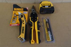 lot 65 image: Dewalt Tape Measure with Retractable Knife, Tin Snips and Bit Holder