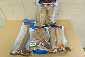 lot 121 image: Assorted Dog BonesTreats -Pig Ears, Meaty Bones, Bully Sticks