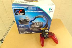 lot 138 image: Steering Wheel and Controller for Playstation 2