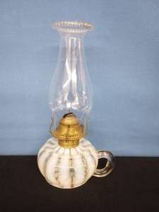 lot 22 image: Antique Opalescent finger lamp