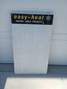 lot 49 image: Easy Heat Heating Cable Products Automotive Metal Peg Board Display