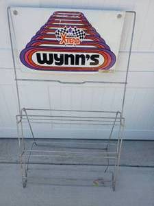 lot 50 image: Vintage Metal Wynns Oil Can Display Rack