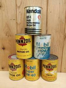 lot 53 image: Vintage Penzoil, Kendall, and Mobil One Quart Oil Cans