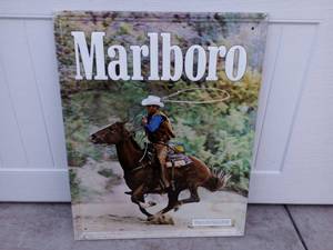 lot 63 image: Vintage 1980s The Marlboro Man Cowboy Cigarette Sign