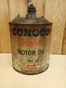 lot 78 image: Vintage Double Sided Conoco Super Motor Oil 5 Gallon Can