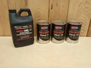 lot 97 image: Three Amzoil Diesel Oil 1 Quart Cans