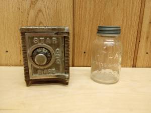 lot 125 image: Vintage Cast Iron Star Safe Coin Bank, and Atlas Jar Coin Bank