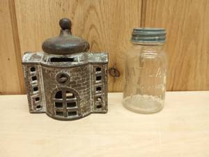 lot 126 image: Antique Kenton Cast Iron Domed Coin Bank, and Atlas Jar Coin Bank